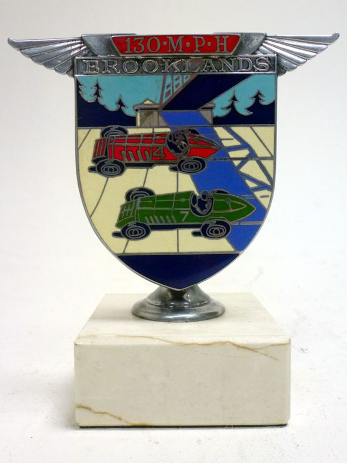 A Brooklands '130 MPH' Enamel Car Badge