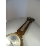 An Oak Banjo barometer A/F and one other