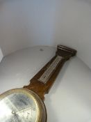 An Oak Banjo barometer A/F and one other