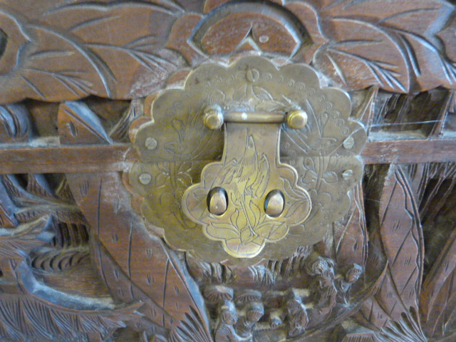 A Chinese Camphorwood chest with heavily carved inset decoration - Image 3 of 5