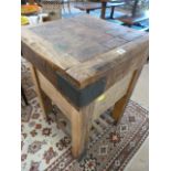 A butchers style block on legs with drawers to front