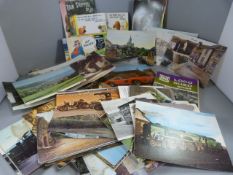 A quantity of Vintage postcards including various comical scenes