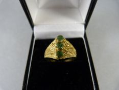 A 9ct Gold Ring with three emeralds