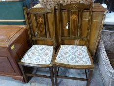 A pair of inlaid hall chairs