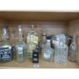 A quantity of Jack Daniels Collector Bottles and decanters - to include A Royal Doulton Decanter