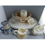 A quantity of various china to include Portmeirion, Wedgwood and Clarice Cliff etc - 2 shelves