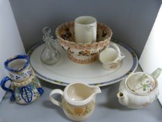 A quantity of various china to include Portmeirion, Wedgwood and Clarice Cliff etc - 2 shelves