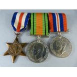 A Defense medal, War Medal and a French and Germany Star