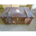 A Large steamer trunk marked GCP 'Harrods' - torn sticker to front ' Cunard White Star Line possibly