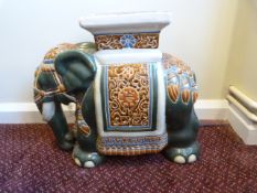 A Indian china elephant in the form of a stool