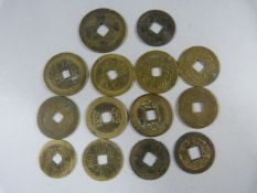 A Collection of Chinese coin/tokens (14 in total) some with age.