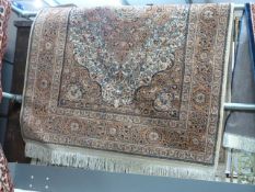 A Beige ground rug with all over design
