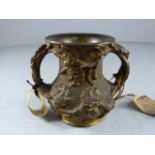 A bronze two handled vessel (5.5cm High) decorated in oak branches, leaves and acorns. Attached