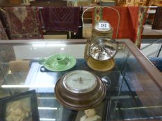 A carriage lamp, oak barometer and enamelled candle holder
