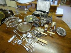 A quantity of silverplated items to include cutlery, candelabra etc