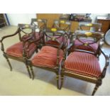 A set of six Regency style dining chairs with lattice work seats