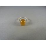 A Yellow Opal and silver ring