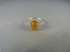 A Yellow Opal and silver ring