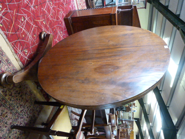 A Victorian mahogany breakfast table