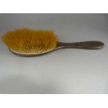 A Hallmarked silver dressing table brush