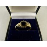 A 9ct Gold ring with Sapphires and Diamonds