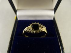 A 9ct Gold ring with Sapphires and Diamonds