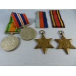 Set of four WW2 medals- Defence medal, war medal, 1939-45 star and Burma star