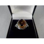 A Silver ring with Amber Stone