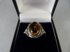 A Silver ring with Amber Stone