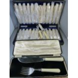 A canteen of silverplated fish knives and forks and a boxed serving set