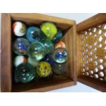 A small quantity of marbles in box