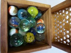 A small quantity of marbles in box