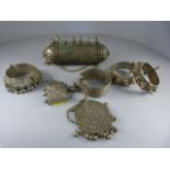 A collection of silver Eastern Jewellery (no hallmarks) to include four bangles, two matching