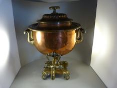 A Large copper samovar with decorated handles