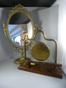 An Ornate Table mirror by Charles Ives and a Gong