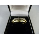 A 9ct Gold ring with 7 diamonds engraved Je T'aime on inner ring