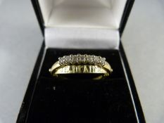 A 9ct Gold ring with 7 diamonds engraved Je T'aime on inner ring