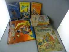A collection of vintage books including Rupert, Sindy books, Enid Blyton, Walt Disney's Pop Up