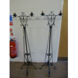 A Pair of cast iron candelabras