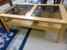 A Glass topped coffee table