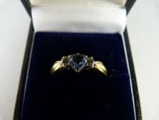 18ct Gold Ring set with Pale Sapphire and Diamonds