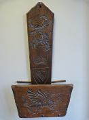 A Wooden hanging unit - with chinese dragons to front