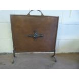 An Arts and Crafts copper fire screen