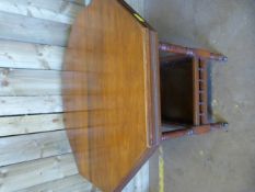 An octagonal mahogany occasional table