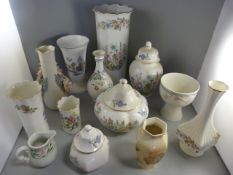 A quantity of decorative china to include Aynsley, Wedgwood etc 3 shelves