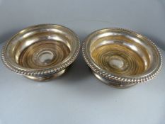 A Pair of Birmingham hallmarked silver Wine Coasters with inset wooden base