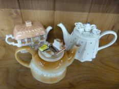 Three novelty teapots