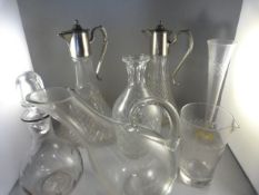 Two silverplated decanters, two others and bud vases etc