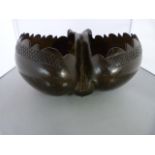 A Coco De Mer double shell believed to have been carved in the Seychelles, in the form of a Basket/