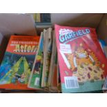 A quantity of Beano annuals, Garfield books and other childrens collectible books etc